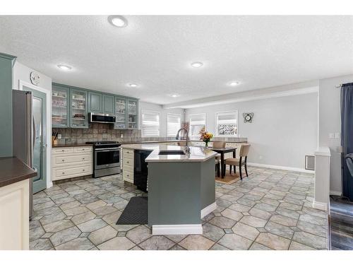 11 Bow Ridge Road, Cochrane, AB - Indoor Photo Showing Kitchen