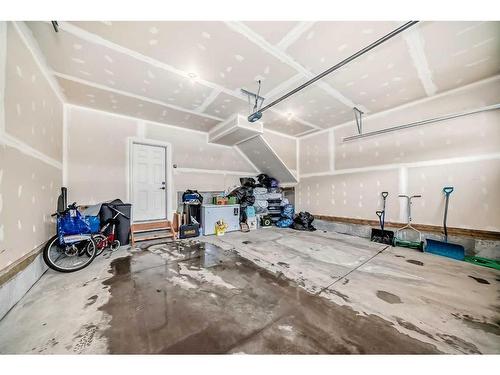 91 Carrington Crescent Nw, Calgary, AB - Indoor Photo Showing Garage