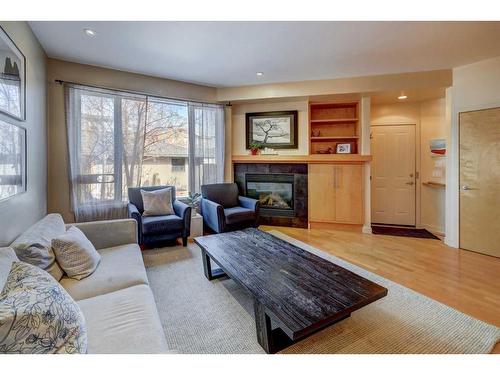 2610 2 Avenue Nw, Calgary, AB - Indoor Photo Showing Living Room With Fireplace