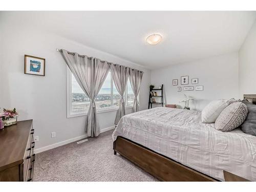 109 Evansridge Place Nw, Calgary, AB - Indoor Photo Showing Bedroom