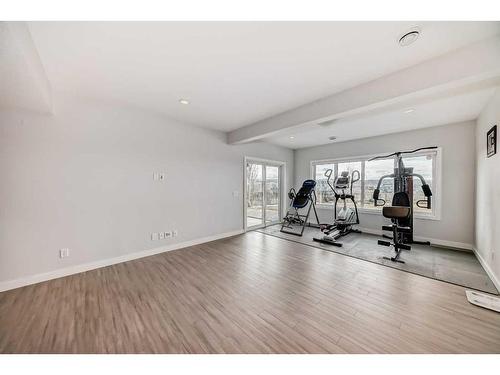 109 Evansridge Place Nw, Calgary, AB - Indoor Photo Showing Gym Room