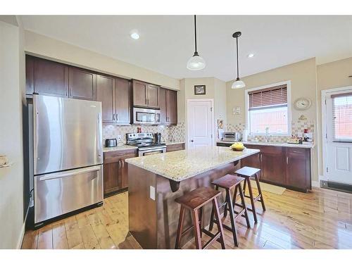 600-413 River Avenue, Cochrane, AB - Indoor Photo Showing Kitchen With Upgraded Kitchen