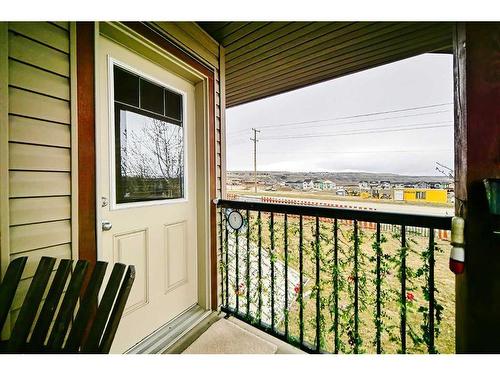 600-413 River Avenue, Cochrane, AB - Outdoor With Balcony With Exterior