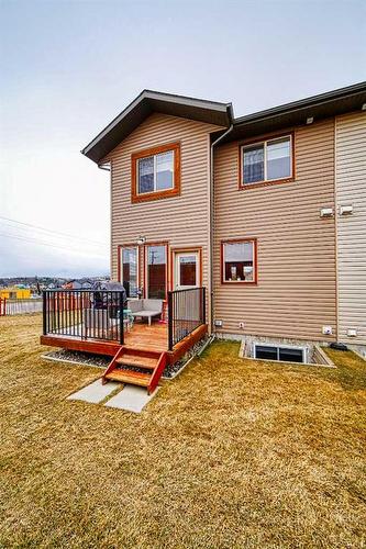 600-413 River Avenue, Cochrane, AB - Outdoor With Exterior