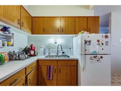 122 12 Avenue Ne, Calgary, AB - Indoor Photo Showing Kitchen With Double Sink