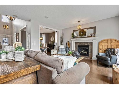 51 Tuscany Estates Close Nw, Calgary, AB - Indoor Photo Showing Living Room With Fireplace