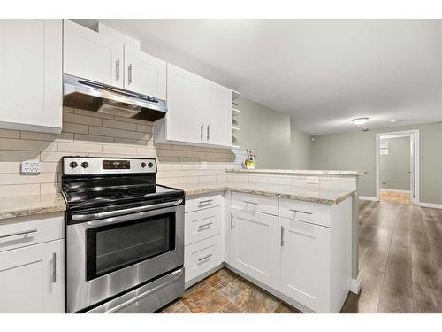 116 54 Avenue Nw, Calgary, AB - Indoor Photo Showing Kitchen With Upgraded Kitchen