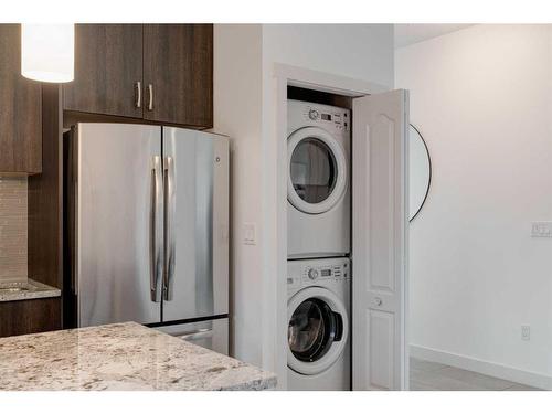 106-303 13 Avenue Sw, Calgary, AB - Indoor Photo Showing Laundry Room