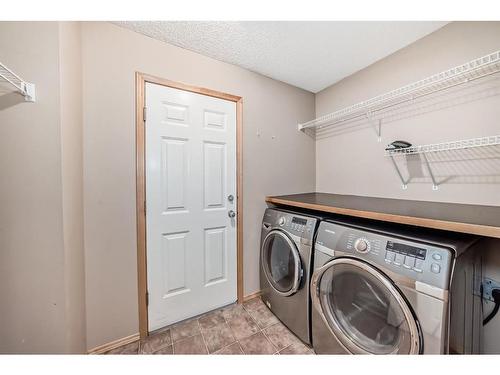 94 Cranfield Green Se, Calgary, AB - Indoor Photo Showing Laundry Room