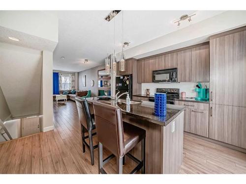 67 Silverado Way Sw, Calgary, AB - Indoor Photo Showing Kitchen With Upgraded Kitchen