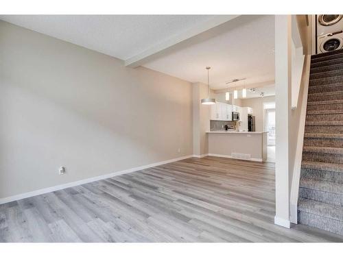 35 New Brighton Point Se, Calgary, AB - Indoor Photo Showing Other Room