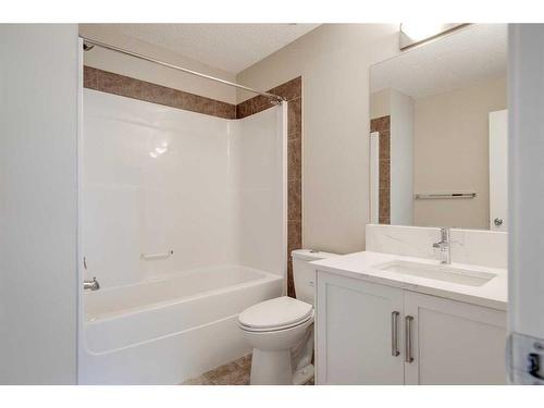 35 New Brighton Point Se, Calgary, AB - Indoor Photo Showing Bathroom
