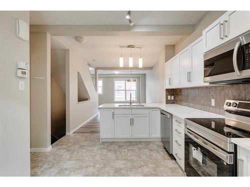 35 New Brighton Point Se, Calgary, AB - Indoor Photo Showing Kitchen With Upgraded Kitchen