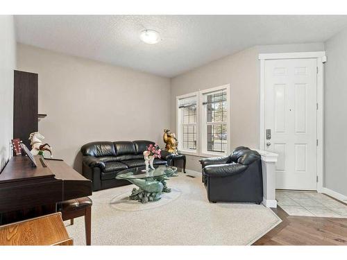 159 Panamount Circle Nw, Calgary, AB - Indoor Photo Showing Living Room