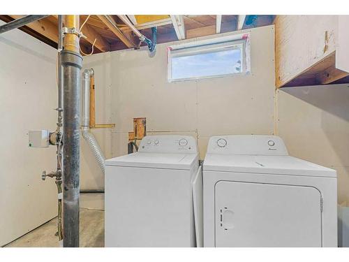 7832 Hunterslea Crescent Nw, Calgary, AB - Indoor Photo Showing Laundry Room