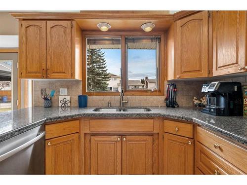 208 Templevale Place Ne, Calgary, AB - Indoor Photo Showing Kitchen With Double Sink