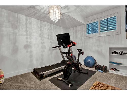 16 Hong Kong Road Sw, Calgary, AB - Indoor Photo Showing Gym Room