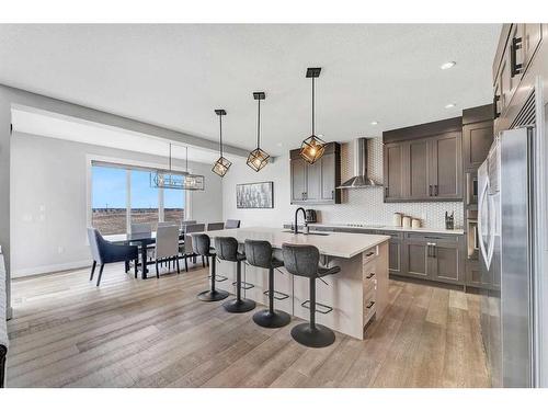 26 Chelsea Bay, Chestermere, AB - Indoor Photo Showing Kitchen With Upgraded Kitchen