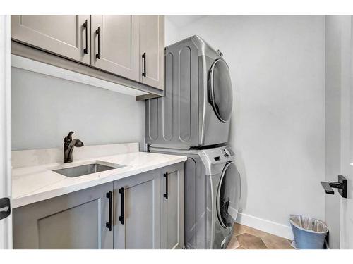 26 Chelsea Bay, Chestermere, AB - Indoor Photo Showing Laundry Room