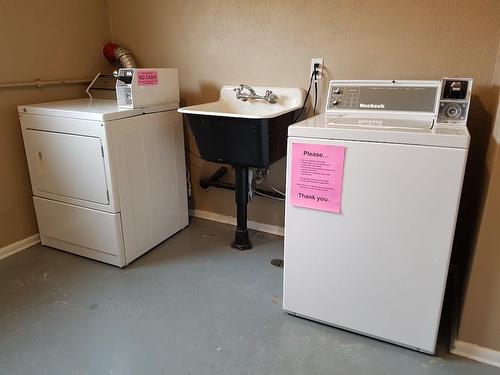 2729 38 Street Sw, Calgary, AB - Indoor Photo Showing Laundry Room