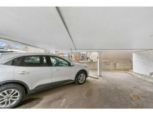 303-2317 17A Street Sw, Calgary, AB - Indoor Photo Showing Garage