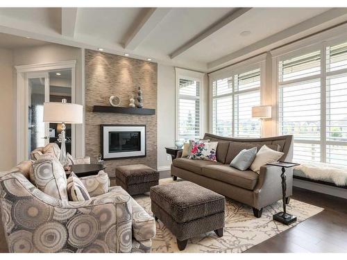 278 Mahogany Manor Se, Calgary, AB - Indoor Photo Showing Living Room With Fireplace