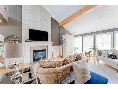 338 Superior Avenue Sw, Calgary, AB - Indoor Photo Showing Living Room With Fireplace