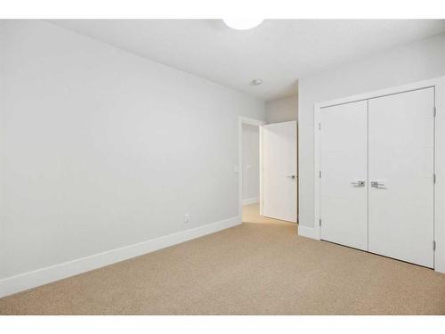 114 Valour Circle Sw, Calgary, AB - Indoor Photo Showing Other Room