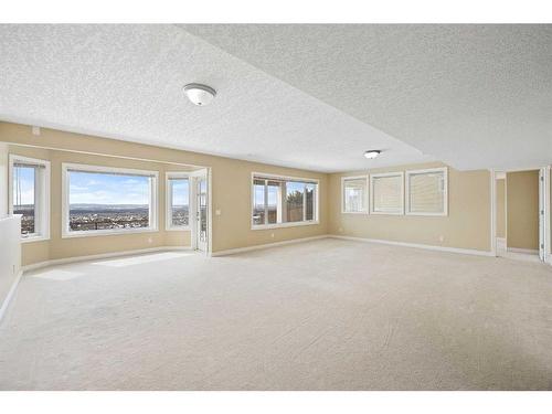 315 Rocky Ridge Drive Nw, Calgary, AB - Indoor Photo Showing Other Room