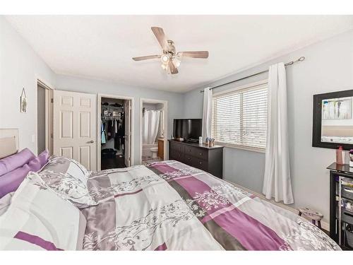 12-117 Bow Ridge Drive, Cochrane, AB - Indoor Photo Showing Bedroom
