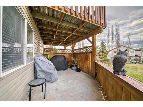 12-117 Bow Ridge Drive, Cochrane, AB - Outdoor With Deck Patio Veranda With Exterior