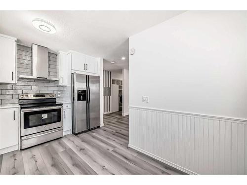 88 Falmead Road Ne, Calgary, AB - Indoor Photo Showing Kitchen With Stainless Steel Kitchen