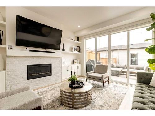 6427 Bow Crescent Nw, Calgary, AB - Indoor Photo Showing Living Room With Fireplace