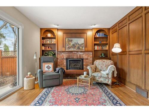 624 Willingdon Boulevard Se, Calgary, AB - Indoor Photo Showing Living Room With Fireplace