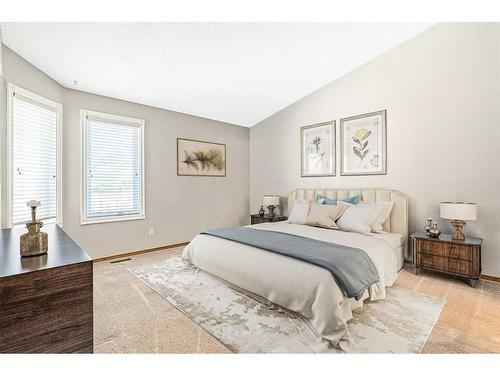 2 Rivercrest Villas Se, Calgary, AB - Indoor Photo Showing Bedroom