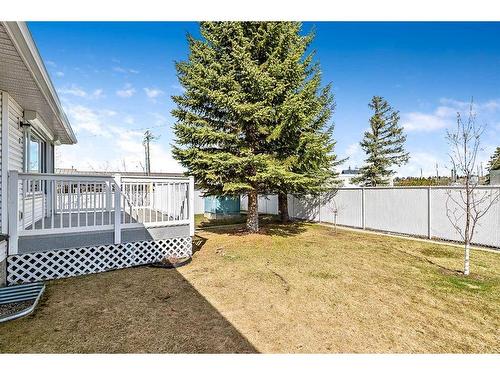 2 Rivercrest Villas Se, Calgary, AB - Outdoor With Deck Patio Veranda