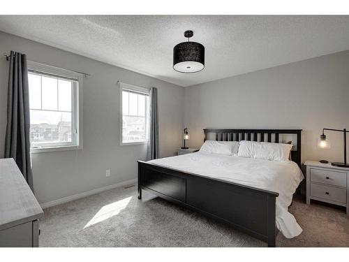 79 Copperpond Square Se, Calgary, AB - Indoor Photo Showing Bedroom