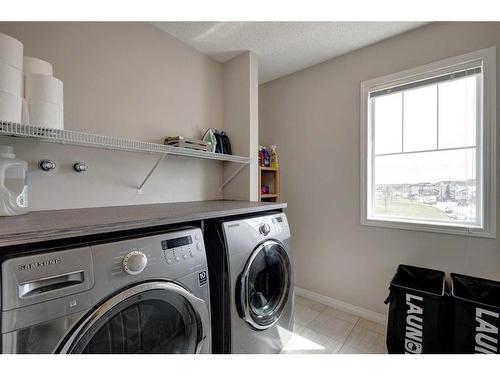 79 Copperpond Square Se, Calgary, AB - Indoor Photo Showing Laundry Room