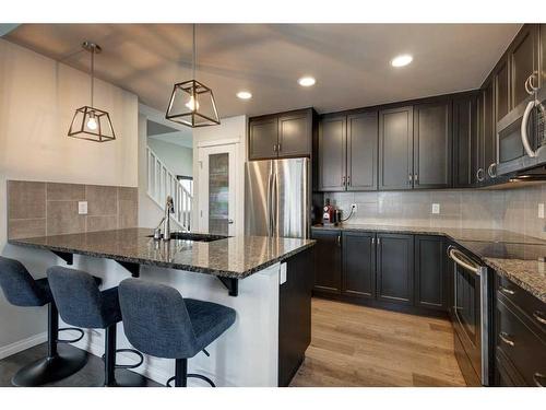 79 Copperpond Square Se, Calgary, AB - Indoor Photo Showing Kitchen With Upgraded Kitchen