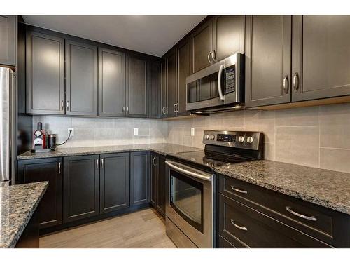 79 Copperpond Square Se, Calgary, AB - Indoor Photo Showing Kitchen