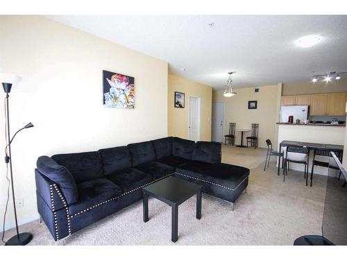 1306-333 Taravista Drive Ne, Calgary, AB - Indoor Photo Showing Living Room