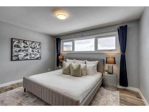 65 Meadowview Road Sw, Calgary, AB - Indoor Photo Showing Bedroom