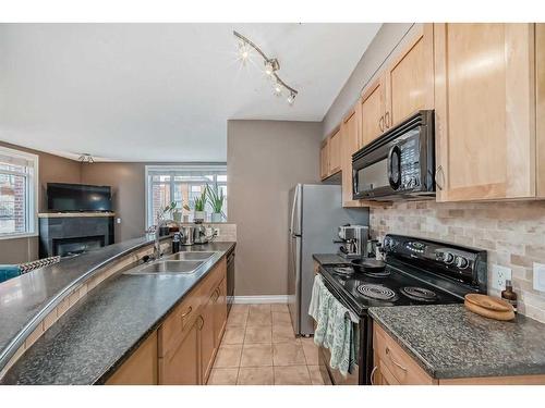 233-910 Centre Avenue, Calgary, AB - Indoor Photo Showing Kitchen With Double Sink
