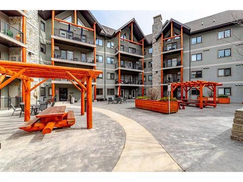 108-77 George Fox Trail, Cochrane, AB - Outdoor With Facade