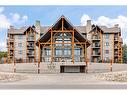 108-77 George Fox Trail, Cochrane, AB  - Outdoor With Facade 