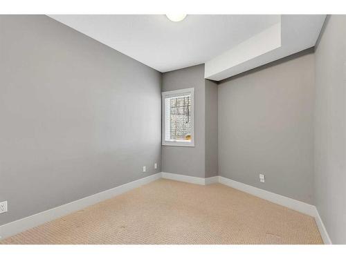 108-77 George Fox Trail, Cochrane, AB - Indoor Photo Showing Other Room