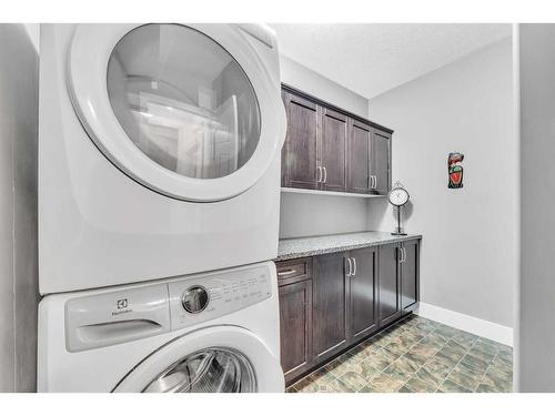 108-77 George Fox Trail, Cochrane, AB - Indoor Photo Showing Laundry Room