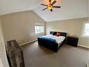 152 Stonemere Point, Chestermere, AB  - Indoor Photo Showing Bedroom 