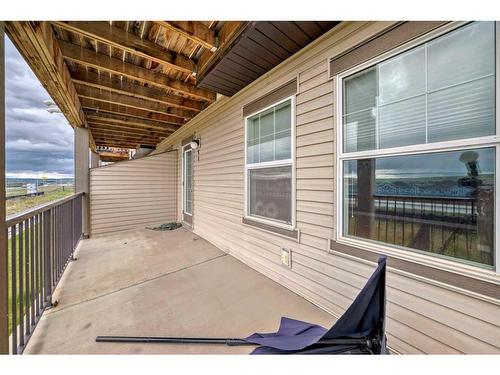 51-28 Heritage Drive, Cochrane, AB - Outdoor With Deck Patio Veranda With Exterior