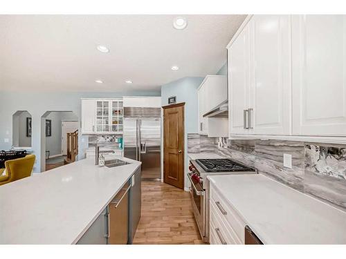 154 New Brighton Manor Se, Calgary, AB - Indoor Photo Showing Kitchen With Double Sink
